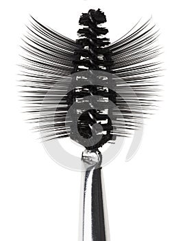 Black mascara brush and false eyelashes