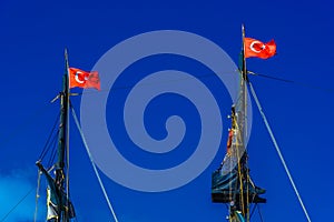 Black masts with Turkish flags