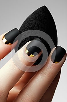 Black matte nail polish. Manicured nail with black matte nail p