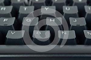 Black mechanical computer keyboard. Macro image, technology background, close up buttons