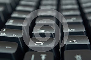 Black mechanical computer keyboard. Macro image, technology background, close up buttons