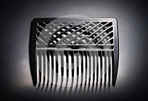 Black metal comb grate background