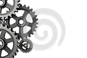 Black metal gears on a white background. Space for text.