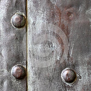 Black metal plate or armour texture with rivets