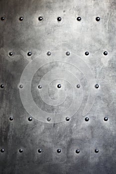 Black metal plate or armour texture with rivets