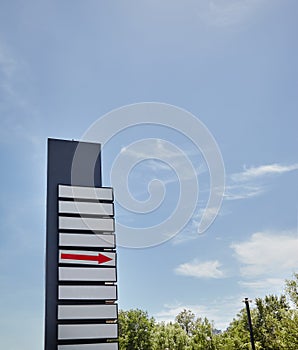 Black metal pole pointer,road sign. Empty sign pointers with a space for text