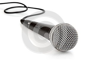 Black microphone with cable isolated