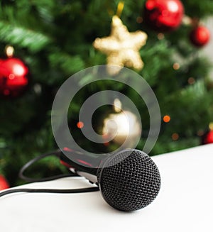 Black microphone with christmas tree