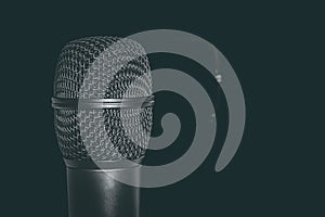 Black microphone head with reflection photo