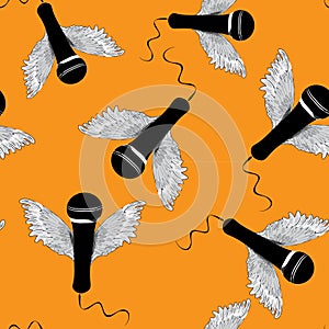 Black microphones with wings. Seamless pattern. Vector illustration on orange background