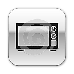 Black Microwave oven icon isolated on white background. Home appliances icon. Silver square button. Vector