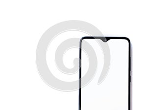 Black mobile smartphone mockup lies on the surface with blank screen isolated on white background