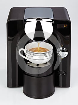 A black modern espresso coffee machine is making a coffee