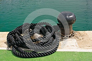 Black mooring knob and rope