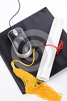 Black Mortarboard and computer mouse