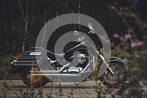 Black motorcycle bagger on the roadside