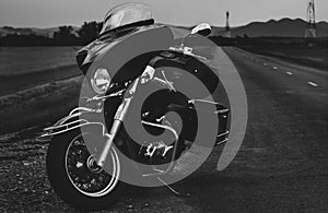 Black motorcycle on the roadside