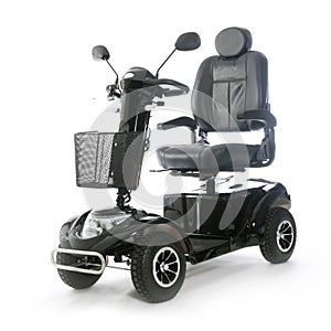 Black motorized mobility scooter fot elderly people photo