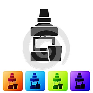 Black Mouthwash plastic bottle and glass icon isolated on white background. Liquid for rinsing mouth. Oralcare equipment