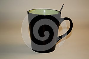 Black mug on a gray background