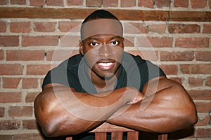 Black muscular man smiling