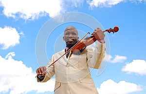 Black musician playing violin