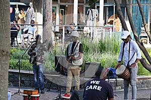 Black musicians playing on the street in Victoria and Alfred waterfront area in Cape Town, South Africa