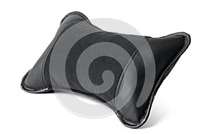 Black neck pillow isolated on a white background.
