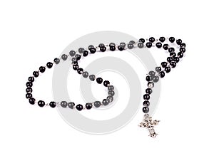 Black necklace with silver cross.