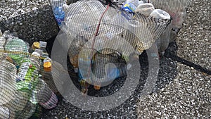 The black net bag with the plastic bag in Koijigahama Beach in Tahara Japan