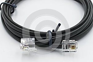 Black network cable isolated on white background