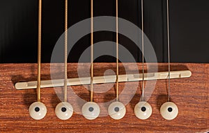 Black new guitar strings closeup