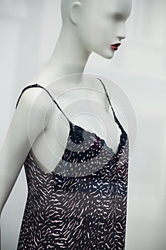 black nightie on mannequin in fashion store showroom