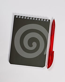 Black Notepad pen isolated on white background