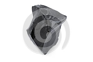 Black obsidian in white background photo