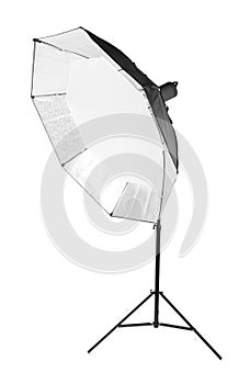 A black octobox in a form of umbrella isolated on a white background. Professional lightning. Photographic equipment.