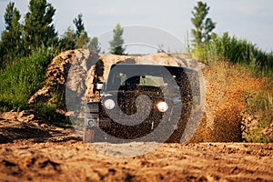 Off road car in mud photo