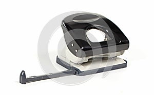 Black office puncher over white background