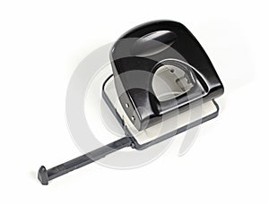 Black office puncher over white background