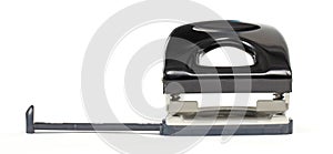 Black office puncher over white background