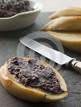 Black Olive Tapenade with toasted baguette