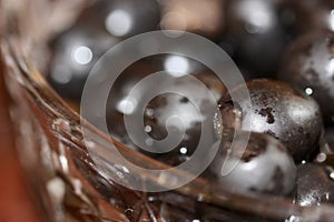 Black olives in a crystal dish macro