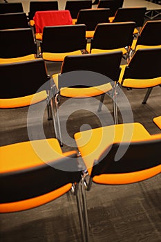 black and orange chairs in the conference room. black and orange chairs.