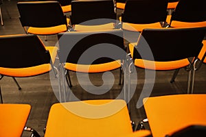 black and orange chairs in the conference room. black and orange chairs.