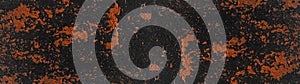 Black orange rustic grunge abstract exfoliated painted spotted texture background