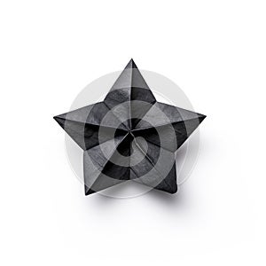 A black origami star on a clean white background