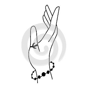 Black outline hand with bracelet and ring in modern mystical style. Vector boho illustrations. Hand drawn doodles sketch