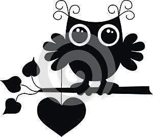 A black owl with a big heart