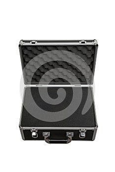 Black padded aluminum briefcase case with metal corners. Case with foam inside. Isolate on a white back