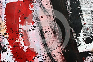 Black paint splashes. Abstract art background. Closeup shot of strokes colorful acrylic paint on canvas with brush stroke